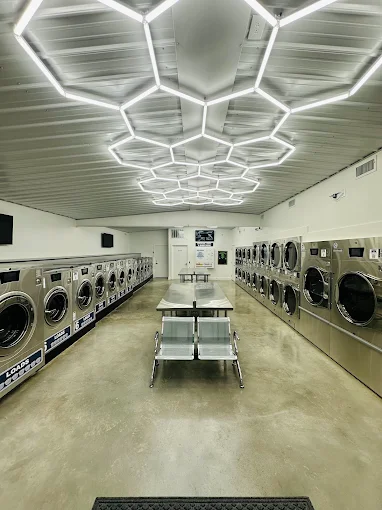 Laundry Room SC interior wide view with hexagonal ceiling lights